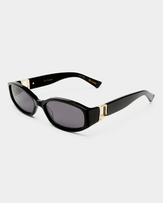 Black sunglasses with gold accents 