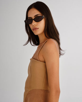 Black sunglasses with a gold hardware, the luv lou lottie in black