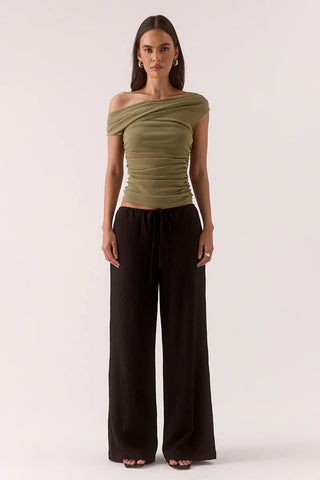 Olive off-shoulder ruched top.