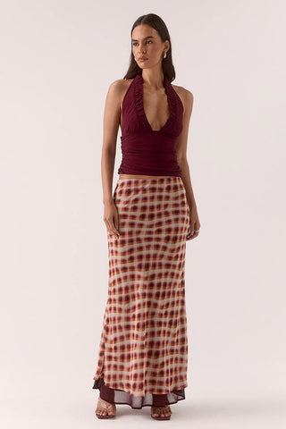 Maxi skirt with a red and cream check pattern.