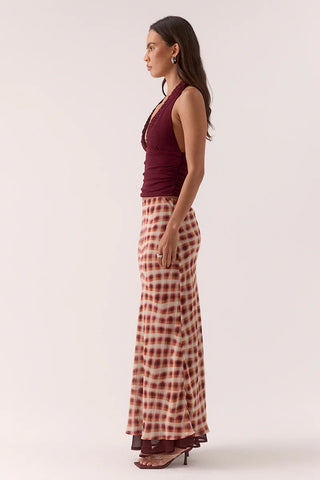 Maxi skirt with a red and cream check pattern.