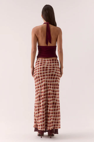 Maxi skirt with a red and cream check pattern.