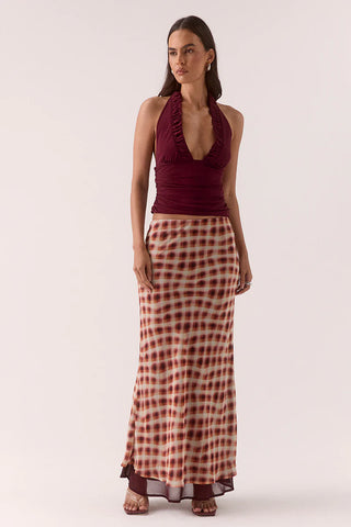 Burgundy halter top with ruched detailing.