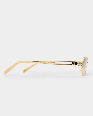 Gold oval frame sunglasses featuring slim split temples and gradient grey lenses.
