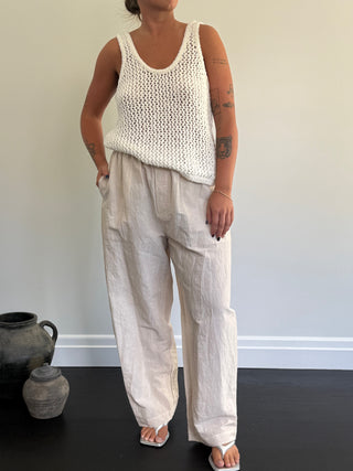 White 100% cotton open knit scoop tank  with 100% linen cotton pants with elastic waist