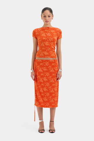 orange midi skirt with floral pattern