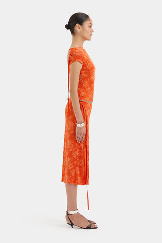 orange midi skirt with floral pattern