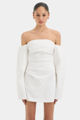 Ivory off shoulder mini dress with structured long sleeves.