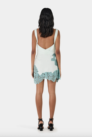 Light blue mini dress with lace detailing and low back