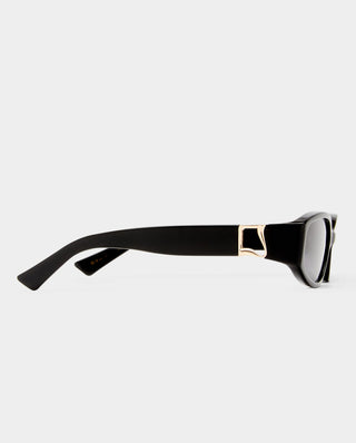Black sunglasses with a gold hardware, the luv lou lottie in black